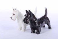 Lot 555 - TWO ROYAL DOULTON FIGURES OF TERRIERS one in...