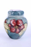 Lot 590 - MOORCROFT SMALL BALUSTER GINGER JAR AND COVER...