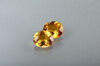 Lot 1168 - TWO UNMOUNTED CITRINES each oval citrine...