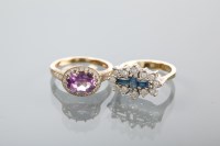 Lot 1169 - AMETHYST AND DIAMOND DRESS RING the oval...