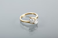 Lot 1171 - DIAMOND TWO STONE RING the two brilliant cut...