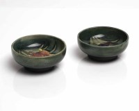 Lot 602 - TWO SMALL MOORCROFT DISHES one in lily pattern,...