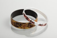 Lot 1280A - TWO ENAMELLED BANGLES BY MICHAELA FREY one...