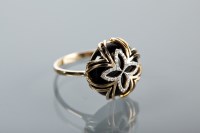 Lot 1290 - ONYX AND DIAMOND DRESS RING of circular form,...