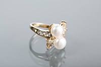 Lot 1293 - PEARL AND WHITE SAPPHIRE DRESS RING set with...