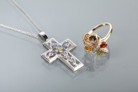 Lot 1298 - DIAMOND AND SAPPHIRE CROSS PENDANT AND A MULTI-...