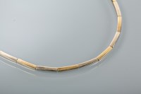 Lot 1328 - NINE CARAT GOLD BI-COLOUR GOLD NECKLACE with...