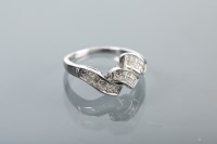 Lot 1333 - EIGHTEEN CARAT WHITE GOLD DIAMOND SET RING...