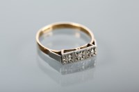 Lot 1341 - EARLY TWENTIETH CENTURY DIAMOND THREE STONE...