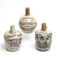 Lot 616 - THREE 19TH CENTURY STONEWARE WHISKEY FLAGONS
