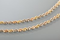 Lot 1363 - TRI-COLOUR GOLD NECKLACE AND BRACELET SET...