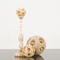 Lot 111 - THREE CHINESE IVORY CONCENTRIC BALLS AND A...