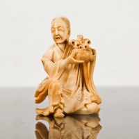 Lot 157 - JAPANESE IVORY OKIMONO modelled in the form of...