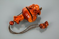 Lot 192 - JAPANESE WOOD SINGLE CASE INRO modelled with a...