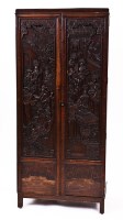 Lot 198 - CHINESE CARVED WOOD PANELS ON WARDROBE the...