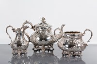 Lot 417 - EDWARDIAN SILVER PLATED THREE PIECE TEA SET...