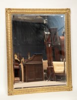 Lot 431 - MODERN GILT FRAMED WALL MIRROR with bevelled...