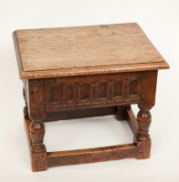 Lot 458 - ANTIQUE CARVED OAK LIDDED STOOL the hinged top...