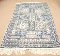 Lot 578 - TURKISH CARPET with geometric floral panels on...