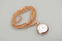 Lot 1026 - FOURTEEN CARAT GOLD FOB WATCH the white dial...