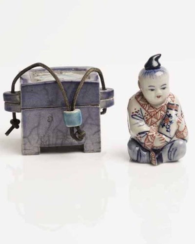 Lot 1074 - TWO ASIAN CERAMICS including a Chinese child...