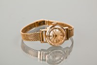 Lot 1052 - LADY'S EIGHTEEN CARAT GOLD LONGINES WRIST...