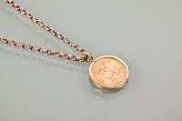 Lot 1057 - HALF SOVEREIGN DATED 1907 in a mount, on a chain