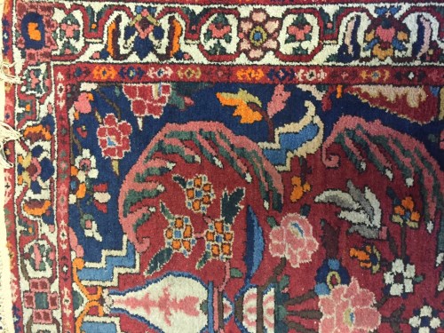 Lot 1080 - CAUCASIAN BORDERED RUG decorated with two...
