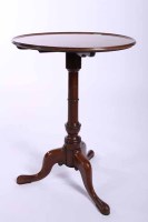 Lot 1117 - 19TH CENTURY MAHOGANY CIRCULAR TEA TABLE on a...