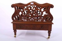 Lot 1153 - VICTORIAN WALNUT MUSIC CANTERBURY with fretted...