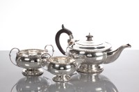 Lot 25 - SILVER THREE PIECE TEA SERVICE of squat...