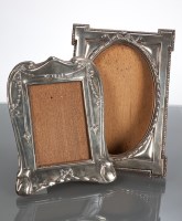 Lot 34 - TWO SILVER PHOTOGRAPH FRAMES with easel...