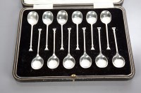 Lot 57 - SET OF TWELVE SILVER SEAL TOP COFFEE SPOONS...