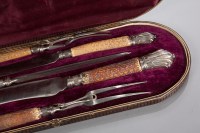 Lot 58 - SILVER MOUNTED HORN HANDLED CARVING SET in a...