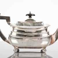 Lot 60 - 20TH CENTURY SILVER TEAPOT of rectangular form...