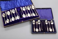 Lot 62 - SET OF TWELVE SILVER TEASPOONS AND TONGS in...