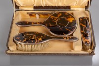 Lot 63 - SILVER AND TORTOISESHELL FOUR PIECE BRUSH SET...