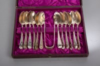 Lot 64 - SET OF TWELVE SILVER TEASPOONS AND TONGS...