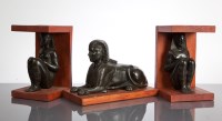 Lot 301 - THREE PATINATED BRONZE EGYPTIAN FIGURES of a...