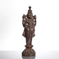 Lot 313 - INDIAN HARDWOOD CARVING OF SHIVA standing on a...