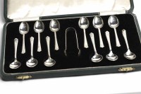 Lot 299 - SET OF TWELVE SILVER TEASPOONS AND TONGS maker...