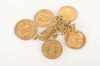 Lot 1032 - GOLD COIN SET BRACELET set with an American...