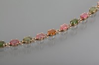 Lot 1120 - TOURMALINE SET BRACELET set with tourmalines...