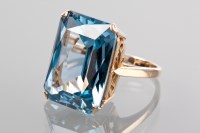 Lot 1162 - LARGE TOPAZ RING the large radiant cut blue...