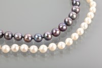 Lot 1187 - BLACK PEARL NECKLACE with spherical black...