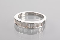 Lot 1200A - DIAMOND SET HALF ETERNITY RING with channel...