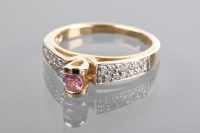 Lot 1204 - PINK GEM AND DIAMOND RING the round pink gem...