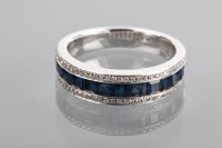 Lot 1209 - SAPPHIRE AND DIAMOND HALF ETERNITY RING with a...