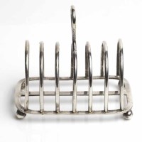 Lot 343A - LATE VICTORIAN SILVER SIX SLICE TOAST RACK...