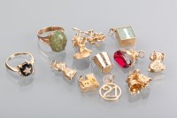 Lot 1249 - TWO GOLD RINGS one set with a green hardstone,...